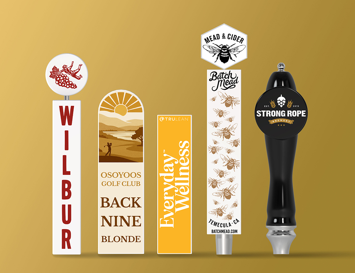 Custom beer tap handles: Wilbur branded knob, Osoyoos Golf Club flat paddle, Everyday Wellness, Batch Mead, and Strong Rope Brewery round knob on gold background